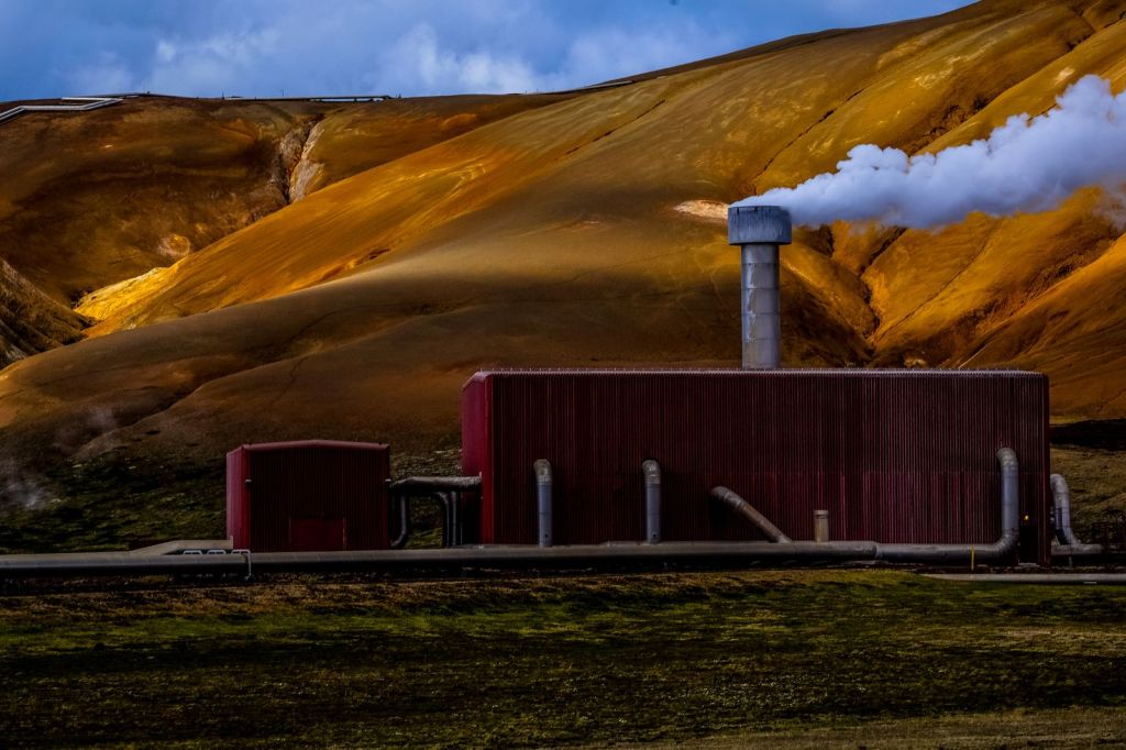 red factory near hills
